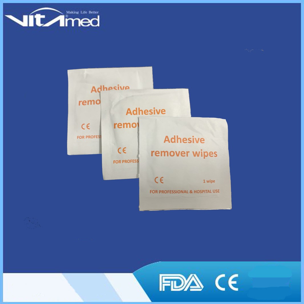 Adhesive remover wipes